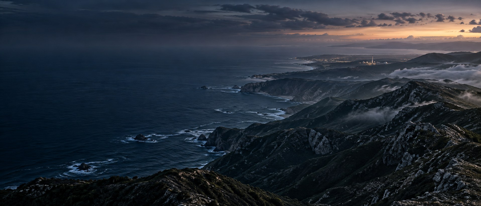 Pacific coastline and mountain ridges at blue hour